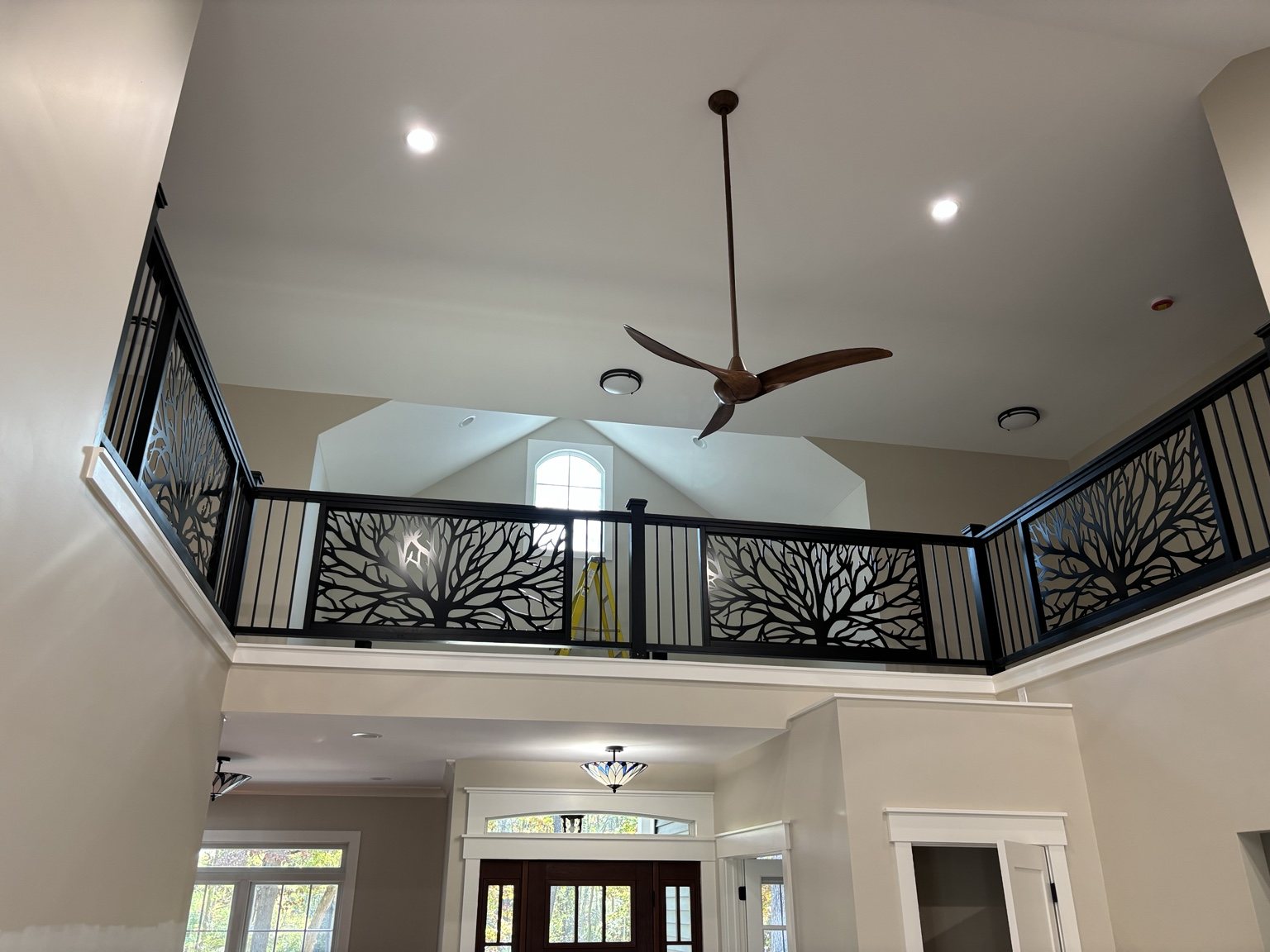 Custom black decorative railing and interior trim work